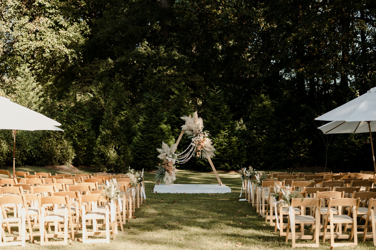 outdoor wedding ceremony at little river farms georgia