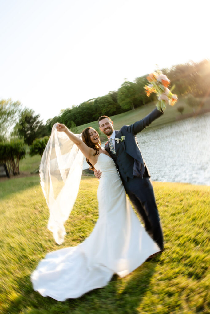 Bride and groom at their barn at moonlight wedding